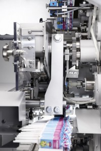 Geordnete Produktabgabe von 350 verpackten Lollipos pro Minute in Top Twist.